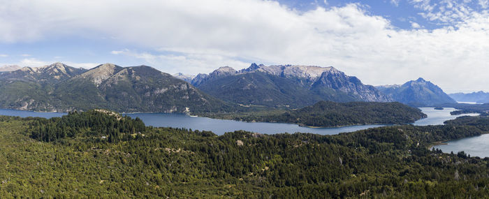 Scenic view of mountains against cloudy sky