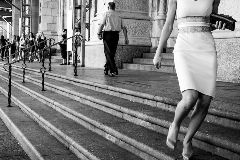 men, walking, lifestyles, full length, person, rear view, railing, leisure activity, built structure, city, casual clothing, city life, architecture, railroad station platform, building exterior, low section, standing