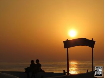Scenic view of sea at sunset