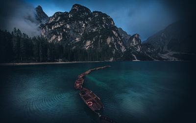 Scenic view of lake against mountain range