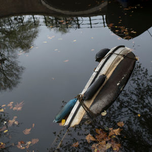 High angle view of boat floating on lake