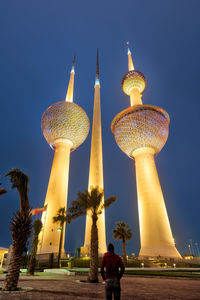 Low angle view of illuminated cathedral against sky at night