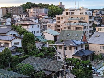 High angle view of residential buildings in city