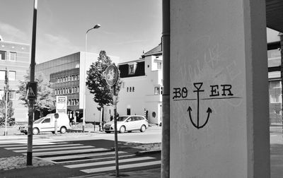 Road sign on street in city
