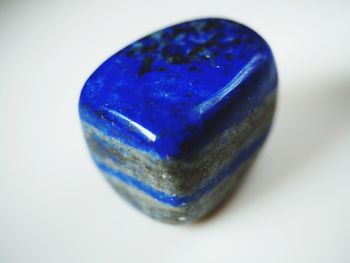 High angle view of blue glass on table