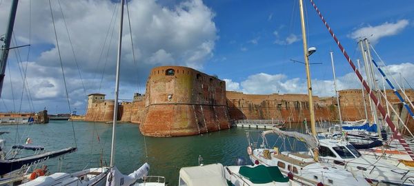 Panoramic view of harbor against sky