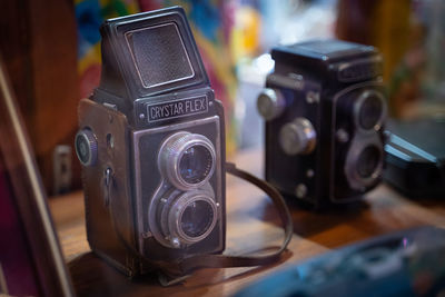 Close-up of camera on table