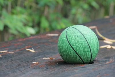 Close-up of green ball on table