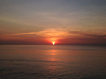 View of calm sea at sunset