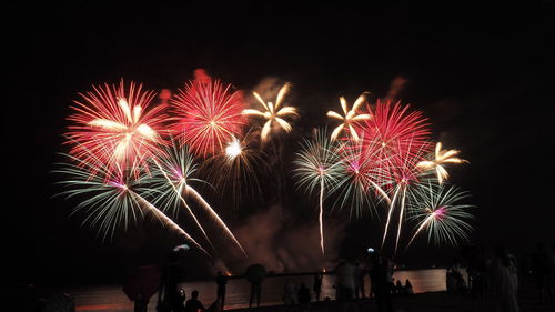 Firework display at night