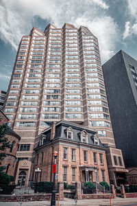 Low angle view of modern building against sky