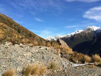 Scenic view of mountains against sky during winter