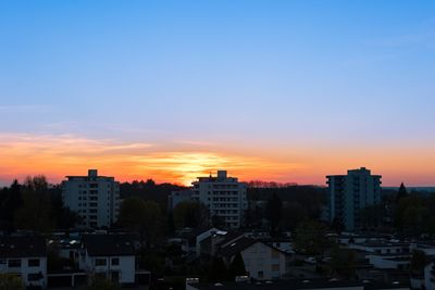 High angle view of city at sunset