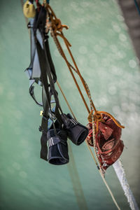 Close-up of bungee equipment hanging on rope