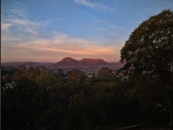 Scenic view of mountains against sky during sunset