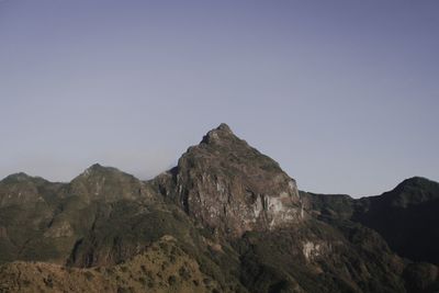 Scenic view of rocky mountains against clear sky