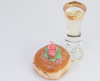 Close-up of drink against white background