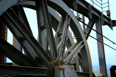 Low angle view of old bridge against sky