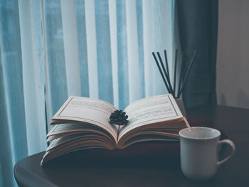 Close-up of coffee cup on table