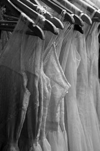 Close-up of clothes drying on rack