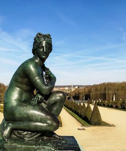 Statue against blue sky