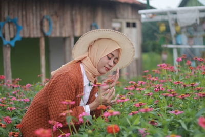 View of an animal on red flower