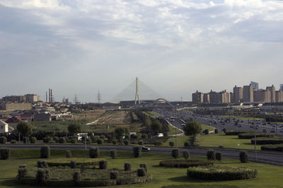 Panoramic view of buildings in city against sky