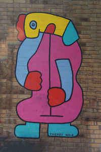 Close-up of graffiti on wall