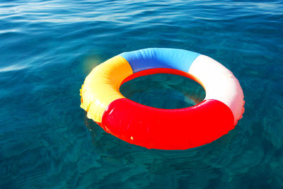 High angle view of inflatable ring floating on swimming pool