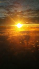 Sun shining through clouds