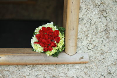 Close-up of flower bouquet on window sill