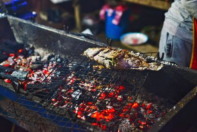 Close-up of meat on barbecue grill