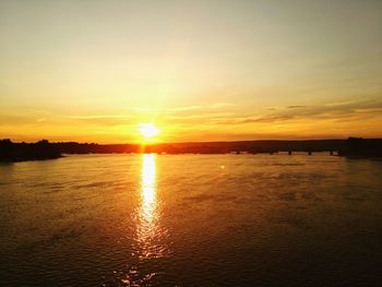 Scenic view of sunset over river