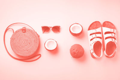 High angle view of various objects on table against white background