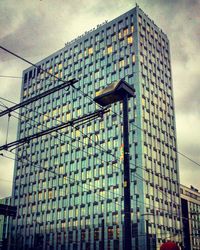 Low angle view of skyscrapers against sky