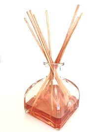 High angle view of bread on glass against white background