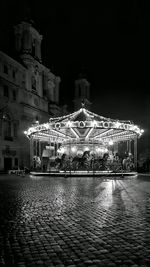 Buildings in city at night