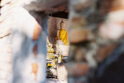 Statue of buddha outside building