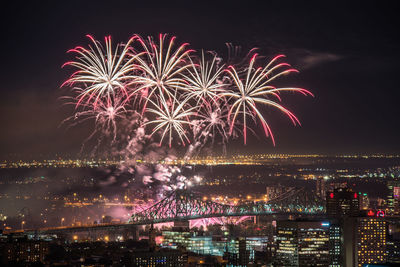 Firework display at night
