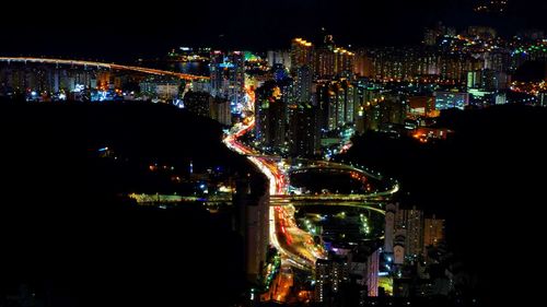 Illuminated cityscape at night