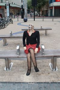 Woman standing in city