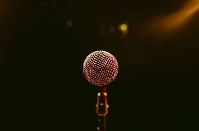 Close-up of illuminated lighting equipment