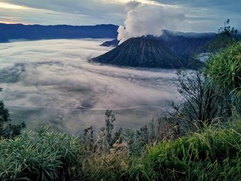 Smoke emitting from volcanic landscape