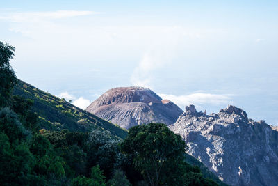 Panoramic view of volcanic mountain against sky