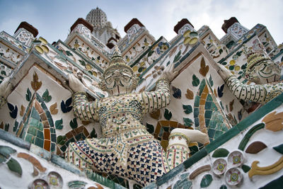 Low angle view of ornate building against sky