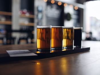 Close-up of beer glass on table