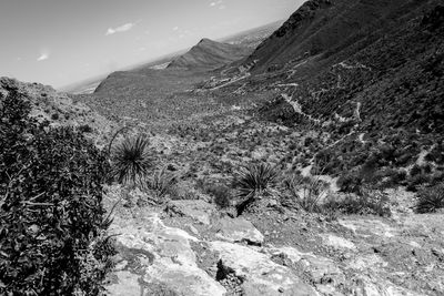 Scenic view of rocky mountains against sky