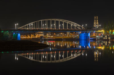 Illuminated bridge in arnhem over river rhein  at night