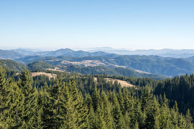 Scenic view of mountains against clear sky