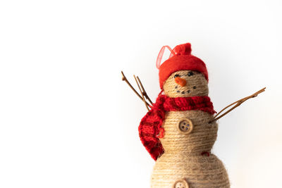 Close-up of red toy against white background